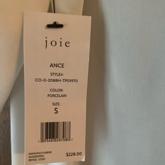 JOIE Ance Top
100 % Silk
Color Porcelain 
Size Small 
Never Worn - Picture 2 of 3